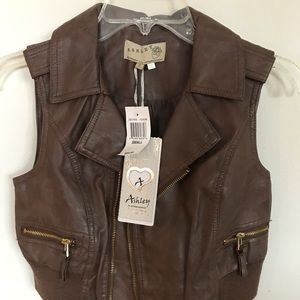Brown leather vest.